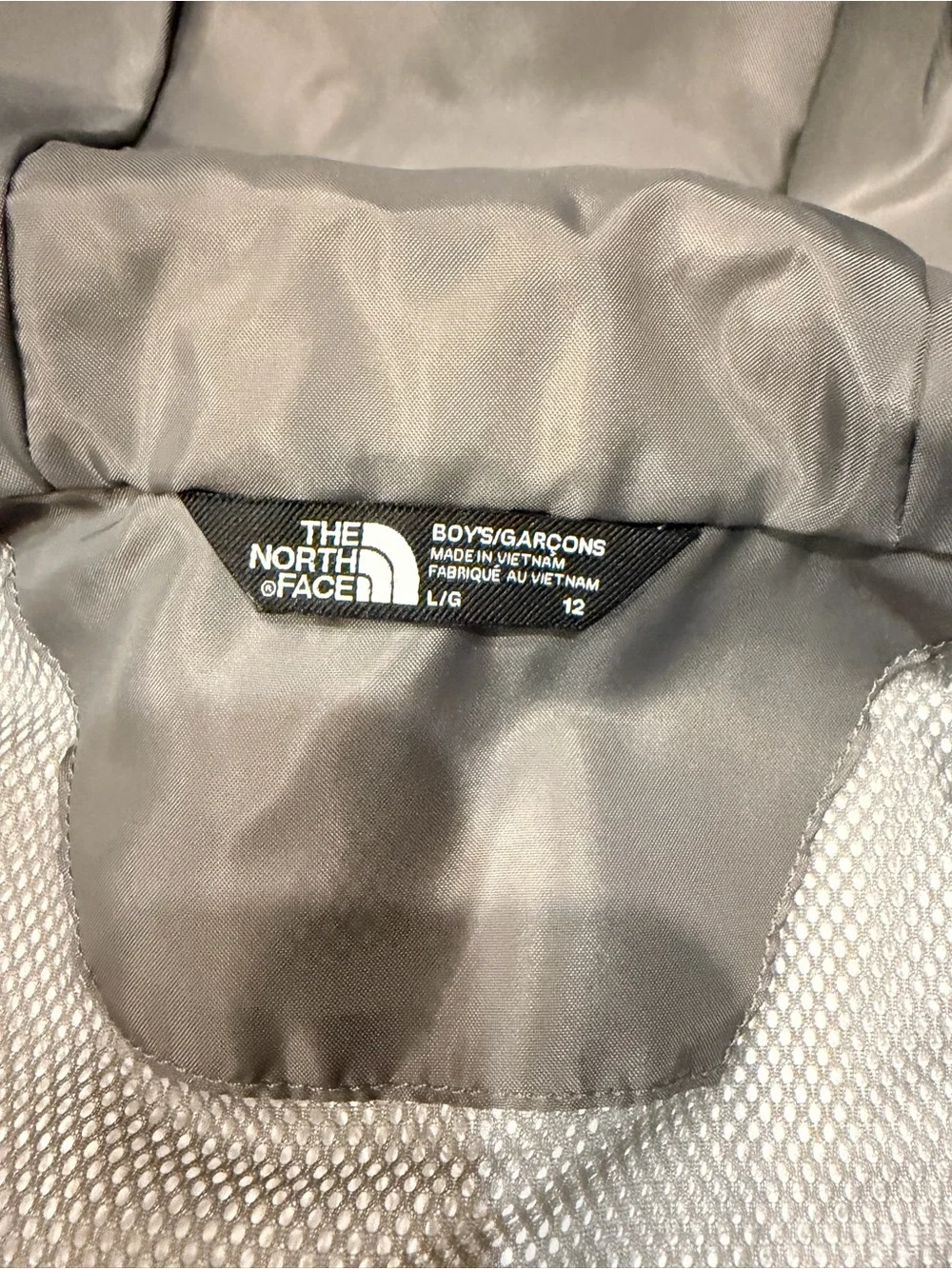 The North Face Gray and Black Kids' Raincoat with Hood